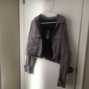 Lilac and black plaid jacket.